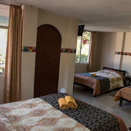 Hotel Flor De Oriente Baños Екстериор снимка